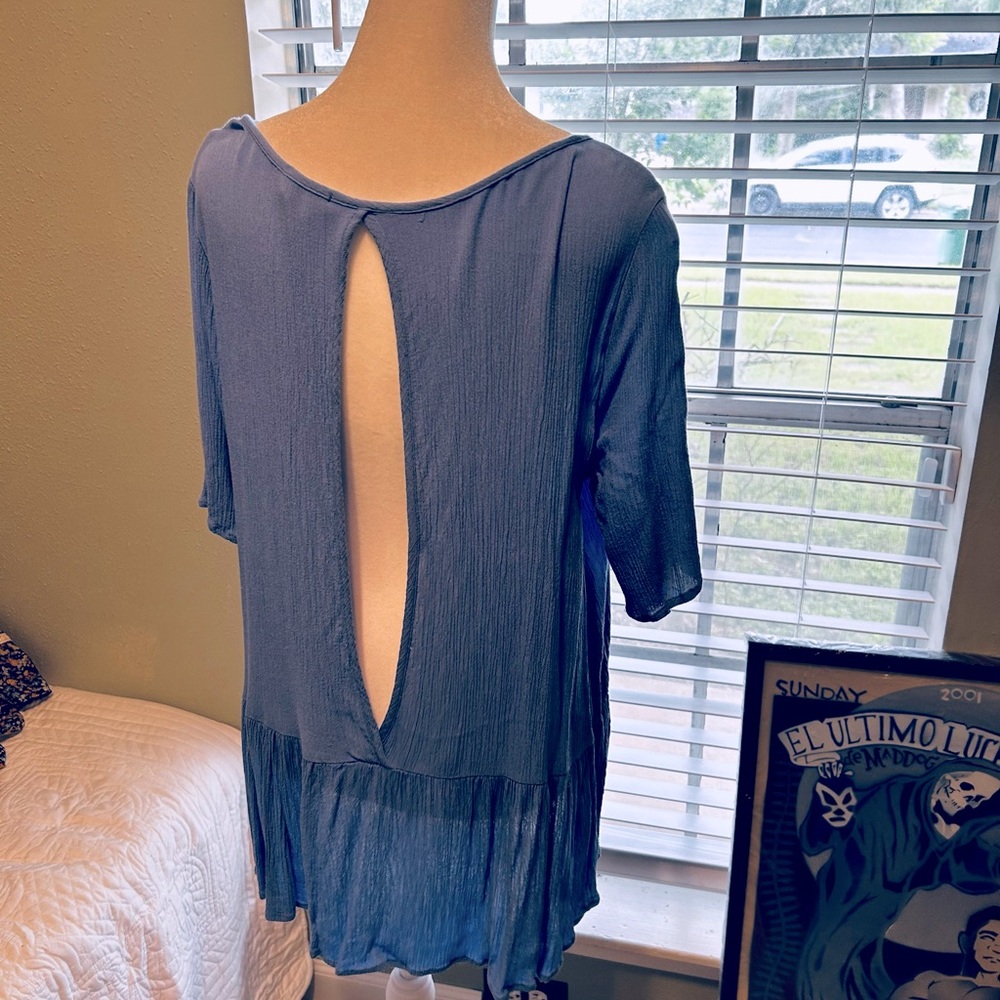 Women’s top by 1.4.3. Story by Line Up flirty open back light blue size Large